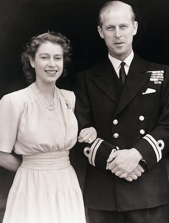 (Original Caption) 7/11/1947-London, England- Princess Elizabeth, Britain's future queen, and Lt. Philip Mountbatten shown at Buckingham Palace. On her engagement finger, the Princess wears a three-diamond ring, symbolic of her bethrotal. Photo was made July 10th when the royal lovers made their first public appearance following announcement of their engagement by King George.