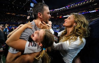 ATLANTA, GA - FEBRUARY 03:  Tom Brady #12 of the New England Patriots celebrates with his wife Gisele BÃ¼ndchen after the Super Bowl LIII against the Los Angeles Rams at Mercedes-Benz Stadium on February 3, 2019 in Atlanta, Georgia. The New England Patriots defeat the Los Angeles Rams 13-3.  (Photo by Kevin C. Cox/Getty Images)