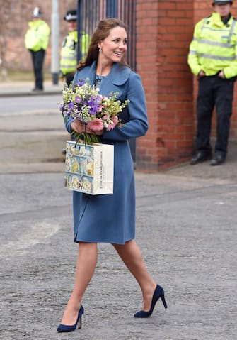 STOKE ON TRENT, ENGLAND - FEBRUARY 18:  Catherine, Duchess of Cambridge visits the Emma Bridgewater factory to see production of a mug the company has launched in support of East Anglia's Children's Hospices on February 18, 2015 in Stoke on Trent, England.  (Photo by Karwai Tang/WireImage)