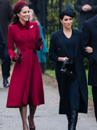 KING'S LYNN, ENGLAND - DECEMBER 25: Catherine, Duchess of Cambridge and Meghan, Duchess of Sussex attend Christmas Day Church service at Church of St Mary Magdalene on the Sandringham estate on December 25, 2018 in King's Lynn, England.  (Photo by Samir Hussein / WireImage)