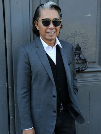 PARIS, FRANCE - SEPTEMBER 27: Designer Kenzo Takada better known as Kenzo attends Tsumori Chisato fashion show at Palais des Beaux Arts as part of the Paris Fashion Week Womenswear Spring/Summer 2015 on September 27, 2014 in Paris, France. (Photo by Jean Catuffe/GC Images)