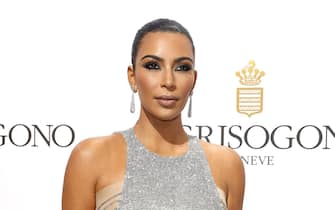 FRANCE CANNES FILM FESTIVAL 2016 epa05313005 US TV personality Kim Kardashian attends the party held by Swiss jewelry company De Grisogono at the Hotel du Cap, Eden Roc, in Cap d'Antibes, France, 17 May 2016, during the 69th annual Cannes Film Festival. The festival runs from 11 to 22 May. EPA/SEBASTIEN NOGIER