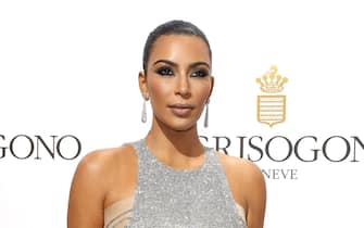 epa05313005 US TV personality Kim Kardashian attends the party held by Swiss jewelry company De Grisogono at the Hotel du Cap, Eden Roc, in Cap d'Antibes, France, 17 May 2016, during the 69th annual Cannes Film Festival. The festival runs from 11 to 22 May.  EPA/SEBASTIEN NOGIER