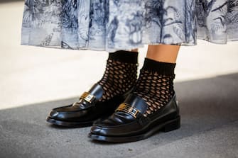 1264553693 BERLIN, GERMANY - AUGUST 07: Sonia Lyson is seen wearing Dior dress with print, brown bag Dior, net socks, Dior loafers, Linda Farrow sunglasses on August 07, 2020 in Berlin, Germany. (Photo by Christian Vierig/Getty Images)