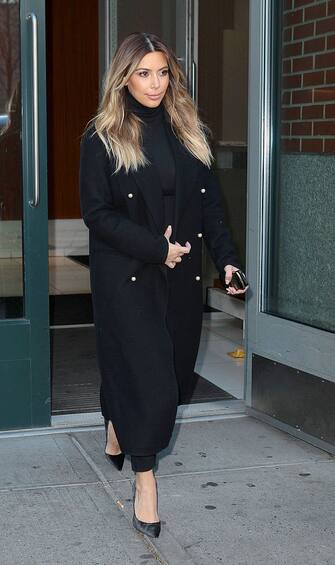 NEW YORK, NY - NOVEMBER 25: Kim Kardashian is seen leaving her apartment on November 25, 2013 in New York City.  (Photo by Ignat/Bauer-Griffin/GC Images)