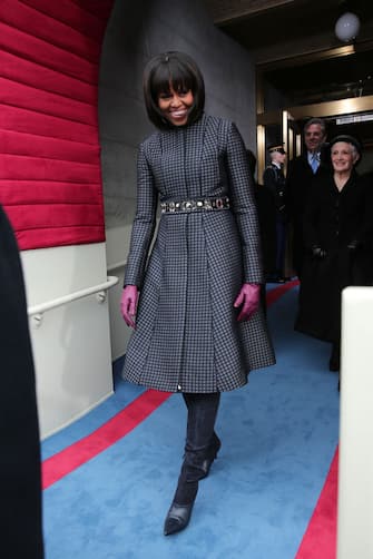 WASHINGTON, DC - JANUARY 21:  First lady Michelle Obama arrives during the presidential inauguration on the West Front of the U.S. Capitol January 21, 2013 in Washington, DC.   Barack Obama was re-elected for a second term as President of the United States.  (Photo by Win McNamee/Getty Images)