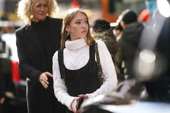 NEW YORK, NEW YORK - FEBRUARY 08: Lila Moss, daughter of Kate Moss, wears a white wool knitted turtleneck pullover, black overalls, outside Longchamp, during New York Fashion Week Fall-Winter 2020, on February 08, 2020 in New York City. (Photo by Edward Berthelot/Getty Images)