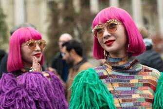 TOPSHOT - Japanese twin sisters of the band Amiaya leave after the Chanel Spring-Summer 2019 Ready-to-Wear collection fashion show at the Grand Palais in Paris, on October 2, 2018. (Photo by - / AFP)        (Photo credit should read -/AFP via Getty Images)