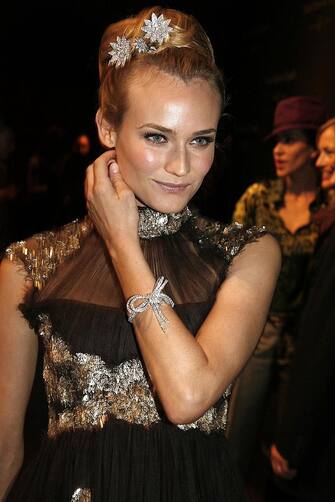 PARIS - OCTOBER 20:  Actress Diane Kruger attends the Van Cleef and Arpels party at the Tuileries Gardens October 20, 2006 in Paris, France. The famous jewelry brand celebrates its centenary this year.  (Photo by Michel Dufour/WireImage)