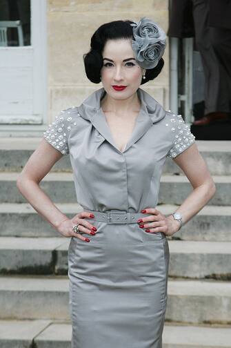 PARIS - JANUARY 26:  Dita Von Teese attends the Christian Dior fashion show during Paris Fashion Week Haute Couture Spring/Summer 2009 at Musee Rodin on January 26, 2009 in Paris, France.  (Photo by Toni Anne Barson/WireImage)