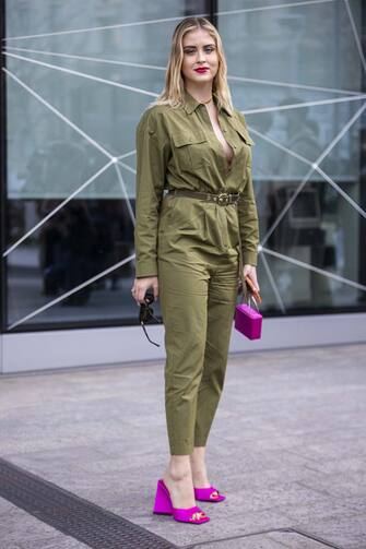 MILAN, ITALY - FEBRUARY 24: Valentina Ferragni poses ahead of the Max Mara fashion show wearing a green jumpsuit during the Milan Fashion Week Fall/Winter 2022/2023 on February 24, 2022 in Milan, Italy. (Photo by Claudio Lavenia/Getty Images)