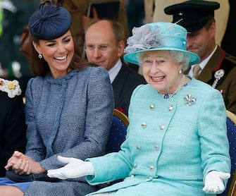 NOTTINGHAM, ENGLAND - JUNE 13:  Catherine, Duchess of Cambridge and Queen Elizabeth II watch part of a children's sports event while visiting Vernon Park during a Diamond Jubilee visit to Nottingham on June 13, 2012 in Nottingham, England.  (Photo by Phil Noble - WPA Pool/Getty Images)