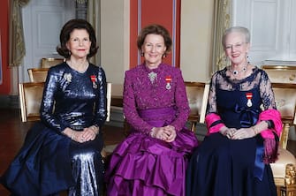 Picture taken on January 17, 2016 at the Royal Castle in Oslo shows (L-R) Queen Silvia of Sweden, Queen Sonja of Norway and Queen Margrethe of Denmark on the occasion of the 25th anniversary of Norway's King Harald's ascension to the throne. / AFP / NTB SCANPIX / Lise AASERUD / Norway OUT        (Photo credit should read LISE AASERUD/AFP via Getty Images)