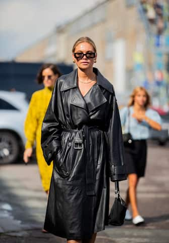 COPENHAGEN, DENMARK - AUGUST 08: Claira Rose Cliteur seen wearing black belted leather coat outside Baum und Pferdgarten during Copenhagen Fashion Week Spring/Summer 2020 on August 08, 2019 in Copenhagen, Denmark. (Photo by Christian Vierig/Getty Images)