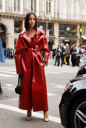 PARIS, FRANCE - SEPTEMBER 30: Alexandra Guerain wearing  red patent trench coat outside Giambattista Valli during Paris Fashion Week Womenswear Spring Summer 2020  on September 30, 2019 in Paris, France. (Photo by Hanna Lassen/Getty Images)
