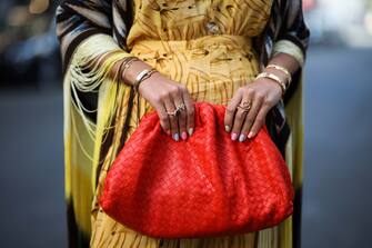 1158887265 BERLIN, GERMANY - JUNE 28: Nina Suess wearing Adriana Degreas dress, Antonia Zander poncho, Bottega Veneta bag and Cartier jewelry on June 28, 2019 in Berlin, Germany. (Photo by Jeremy Moeller/Getty Images)