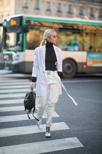 PARIS, FRANCE - JANUARY 21: Caroline 'Caro' Daur wearing white pants, white jacket, black turtleneck is seen outside Schiaparelli during Paris Fashion Week - Haute Couture Spring Summer 2019 on January 21, 2019 in Paris, France. (Photo by Christian Vierig/Getty Images)