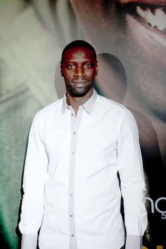 PARIS, FRANCE - OCTOBER 18:  Actor Omar Sy attends the Paris premiere of "Intouchables"at Cinema Gaumont Marignan on October 18, 2011 in Paris, France.  (Photo by Trago/WireImage)