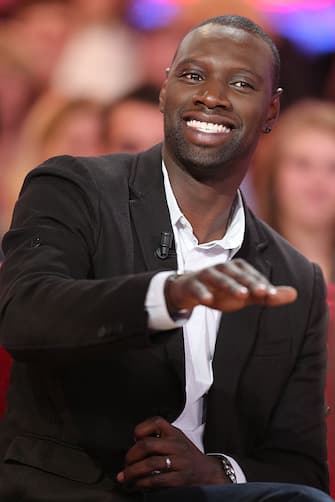 French actor Omar Sy is pictured as he takes part in the TV show "Vivement Dimanche" on December 5, 2012 on a set of French TV France 2 in Paris. AFP PHOTO THOMAS SAMSON        (Photo credit should read THOMAS SAMSON/AFP via Getty Images)