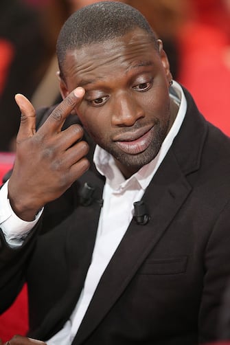 French actor Omar Sy is pictured as he takes part in the TV show "Vivement Dimanche" on December 5, 2012 on a set of French TV France 2 in Paris. AFP PHOTO THOMAS SAMSON        (Photo credit should read THOMAS SAMSON/AFP via Getty Images)