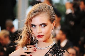 CANNES, FRANCE - MAY 15:  Model Cara Delevingne attends the Opening Ceremony and 'The Great Gatsby' Premiere during the 66th Annual Cannes Film Festival at the Theatre Lumiere on May 15, 2013 in Cannes, France.  (Photo by Traverso/L'Oreal/Getty Images)