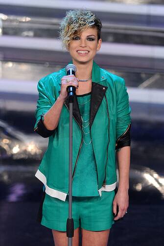 SAN REMO, ITALY - FEBRUARY 14:  Singer  Emma Marrone performs on stage at the opening night of the 62th Sanremo Song Festival at the Ariston Theatre on February 14, 2012 in San Remo, Italy.  (Photo by Venturelli/Getty Images)