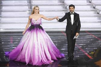 SANREMO, ITALY - FEBRUARY 09:  Michelle Hunziker and Pierfrancesco Favino attend the fourth night of the 68. Sanremo Music Festival on February 9, 2018 in Sanremo, Italy.  (Photo by Venturelli/WireImage)