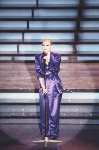 Italian singer Anna Oxa, born Iliriana Hoxha, taken on the stage of the Teatro Ariston, just before her performance at the XXXVIII edition of the Sanremo music festival; she's presenting her new song Quando nasce un amore. Sanremo (IM), Italy, February 1988. (Photo by Rino Petrosino/Mondadori via Getty Images)