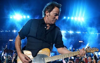 TAMPA, FL - FEBRUARY 01: Musician Bruce Springsteen and the E Street Band perform at the Bridgestone halftime show during Super Bowl XLIII between the Arizona Cardinals and the Pittsburgh Steelers on February 1, 2009 at Raymond James Stadium in Tampa, Florida.  (Photo by Jamie Squire / Getty Images)