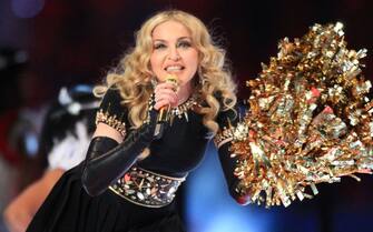 INDIANAPOLIS, IN - FEBRUARY 05: Madonna performs during the Bridgestone Super Bowl XLVI Halftime Show at Lucas Oil Stadium on February 5, 2012 in Indianapolis, Indiana.  (Photo by Christopher Polk / Getty Images)