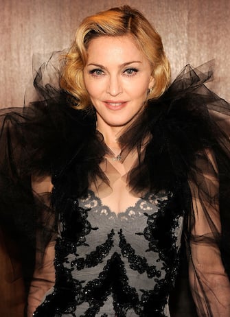 NEW YORK, NY - JANUARY 23:  (EXCLUSIVE COVERAGE) Madonna attends The Weinstein Company with The Cinema Society & Forevermark  premiere of "W.E." at the Ziegfeld Theater on January 23, 2012 in New York City.  (Photo by Kevin Mazur/WireImage)