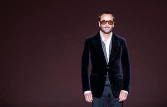 1094673912 Designer Tom Ford appears on the runway after his fashion show at New York Fashion Week on February 6, 2019 in midtown Manhattan, New York City. (Photo by Johannes EISELE / AFP) (Photo by JOHANNES EISELE/AFP via Getty Images)
