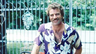 Tom Selleck as the titular investigator in the television series 'Magnum, P.I.', circa 1985. He is posing with his red Ferrari 308. (Photo by Silver Screen Collection/Archive Photos/Getty Images)