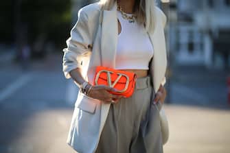 HAMBURG, GERMANY - JUNE 21: Leonie Hanne wearing Valentino bag, Off white top, Storets blazer and Frankie Shop pants on June 21, 2020 in Hamburg, Germany. (Photo by Jeremy Moeller/Getty Images)