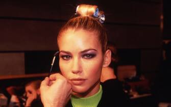 Portrait de Valeria Mazza in the coulisses of a fashion show by Christian Dior, in March 1996, in Paris.