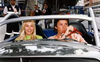 The Argentinean mannequin Valeria Mazza and son fiancé Alejandro Gravier arrived in a Spider Renault aux Essais du Grand Prix de F1 de Monaco le 18 mai 1996. (Photo by Pool MERILLON / REY / Gamma-Rapho via Getty Images)