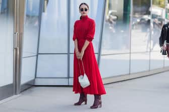 NEW YORK, NY - SEPTEMBER 13: Evangelie Smyrniotaki wearing red dress seen in the streets of Manhattan outside Delpozo during New York Fashion Week on September 13, 2017 in New York City.  (Photo by Christian Vierig / Getty Images)
