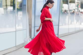 NEW YORK, NY - SEPTEMBER 13: Evangelie Smyrniotaki  wearing red dress seen in the streets of Manhattan outside Delpozo during New York Fashion Week on September 13, 2017 in New York City. (Photo by Christian Vierig/Getty Images)