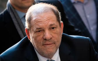 Harvey Weinstein arrives at the Manhattan Criminal Court, on February 24, 2020  in New York City. - The jury in Harvey Weinstein's rape trial hinted it was struggling to reach agreement on the most serious charge of predatory sexual assault as day four of deliberations ended February 21, 2020 without a verdict. The 12 jurors asked New York state Judge James Burke whether they could be hung on one or both of the top counts but unanimous on the three lesser counts. The disgraced movie mogul, 67, faces life in prison if the jury of seven men and five women convict him of a variety of sexual misconduct charges in New York. (Photo by Johannes EISELE / AFP) (Photo by JOHANNES EISELE/AFP via Getty Images)