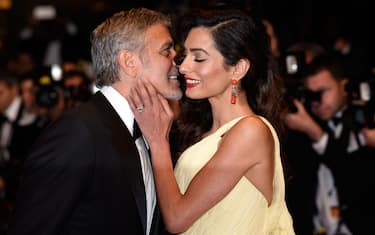 CANNES, FRANCE - MAY 12:  Actor George Clooney and his wife Amal Clooney attend the "Money Monster" premiere during the 69th annual Cannes Film Festival at the Palais des Festivals on May 12, 2016 in Cannes, France.  (Photo by Clemens Bilan/Getty Images)