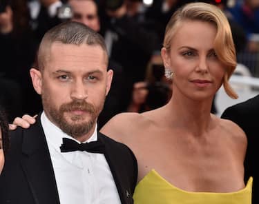 CANNES, FRANCE - MAY 14:  Tom Hardy and Charlize Theron attend the "Mad Max : Fury Road"  Premiere during the 68th annual Cannes Film Festival on May 14, 2015 in Cannes, France.  (Photo by George Pimentel/WireImage)