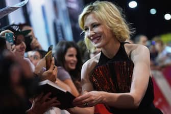 ROME, ITALY - OCTOBER 19:  Cate Blanchett signs autographs on the red carpet of 'The House With A Clock In Its Walls' screening during the 13th Rome Film Fest at Auditorium Parco Della Musica on October 19, 2018 in Rome, Italy.  (Photo by Vittorio Zunino Celotto/Getty Images)