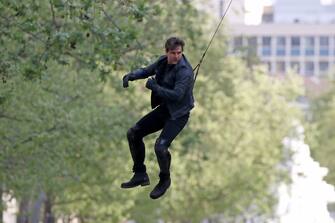 PARIS, FRANCE - APRIL 10:  Actor Tom Cruise performs a stunt on set for 'Mission:Impossible 6 Gemini' filming  on April 10, 2017 in Paris, France.  (Photo by Pierre Suu/GC Images)