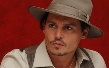 Johnny Depp at the Hollywood Foreign Press Association press conference for the movie "Public Enemies" held in Chicago, Illinois on June 19, 2009. Photo by: Yoram Kahana_Shooting Star. NO TABLOID PUBLICATIONS. NO USA SALES UNTIL SEPTEMBER 20, 2009.