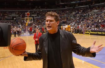 LOS ANGELES - NOVEMBER 14:  David Hasselhoff filming a promotional spot for the NBA at the Los Angeles Lakers versus the Detroit Pistons game on November 14, 2003 at the Staples Center in Los Angeles, California.  NOTE TO USER: User expressly acknowledges and agrees that, by downloading and/or using this photograph, User is concenting to the terms and conditions of Getty Images License Agreement.  (Photo by Noah Graham/NBAE via Getty Images)