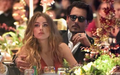 Johnny Depp, Amber Heard e il telefono volato giù dalla finestra