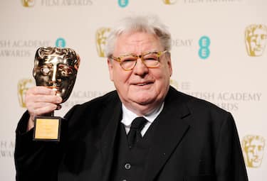 LONDON, ENGLAND - FEBRUARY 10:  (EMBARGOED FOR PUBLICATION IN UK TABLOID NEWSPAPERS UNTIL 48 HOURS AFTER CREATE DATE AND TIME. MANDATORY CREDIT PHOTO BY DAVE M. BENETT/GETTY IMAGES REQUIRED)  Sir Alan Parker, winner of the BAFTA Fellowship, poses in the Press Room at the EE British Academy Film Awards at The Royal Opera House on February 10, 2013 in London, England.  (Photo by Dave M. Benett/Getty Images)