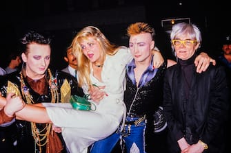 1226805663 Boy George, Cornelia Guest, Marilyn and Andy Warhol during the Hall and Oates after concert party on May 23rd 1985 (Photo by Dave Hogan/Getty Images)