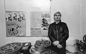 Andy Warhol at the Factory with posters for Tub Girls (1967) and Lonesome Cowboys (1968). (Photo by Jack Mitchell/Getty Images) 