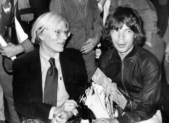 NEW YORK, NY - CIRCA 1977: Andy Warhol and Mick Jagger celebrate the album release of Love You Live at Trax  circa 1977 in New York City. (Photo by Robin Platzer/Images/Getty Images)